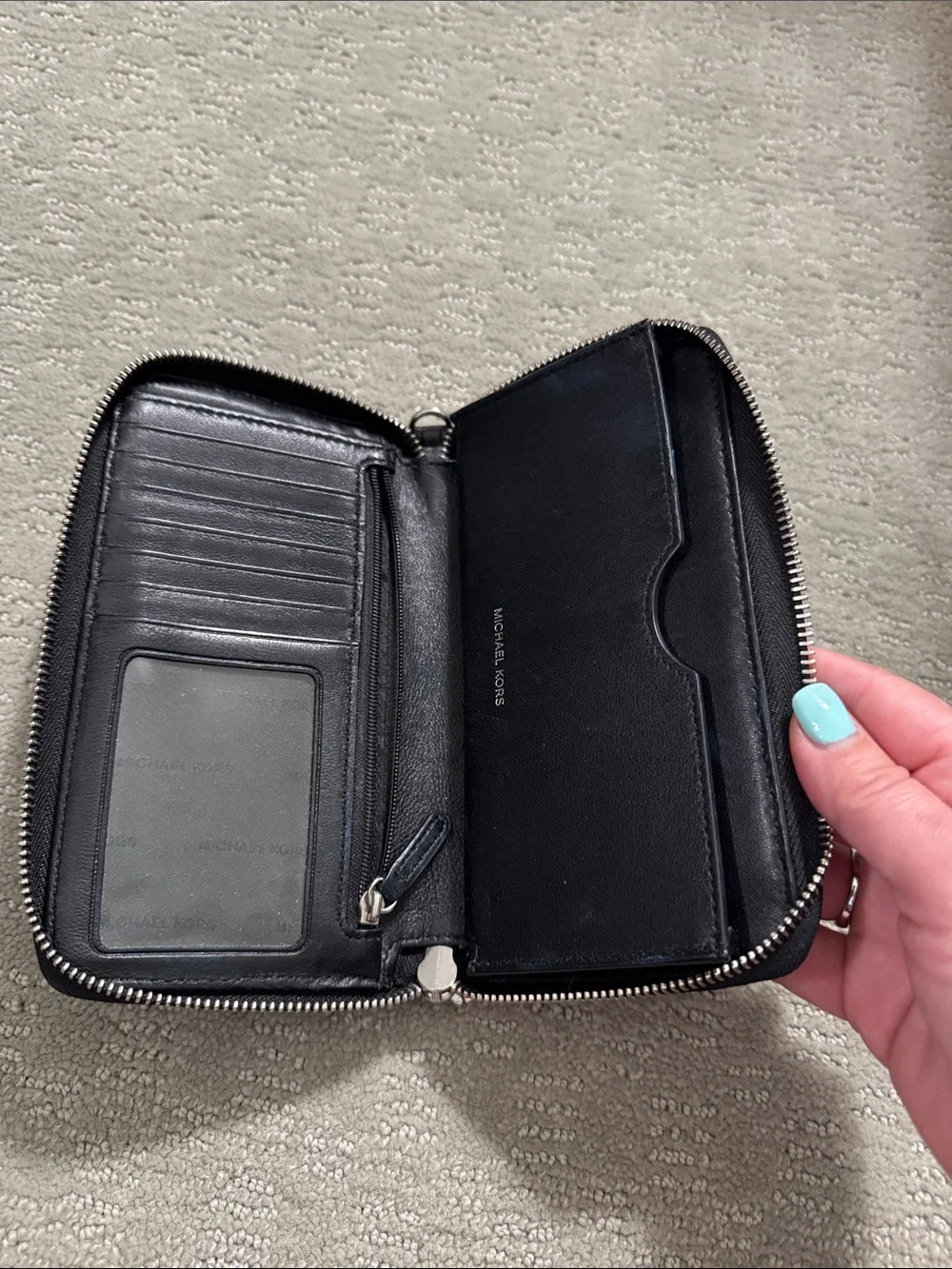 Michael Kors Black Quilted Zip Phone Wallet with Grommet Accents
